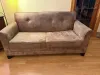 Brown suede loveseat